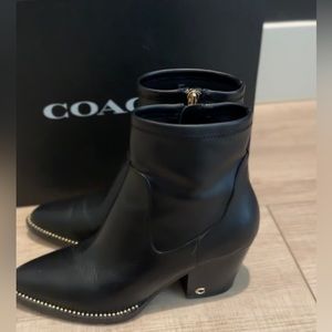 Coach Pella black bootie with gold stud accents